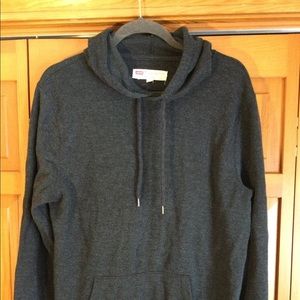 Dark grey hooded sweatshirt.